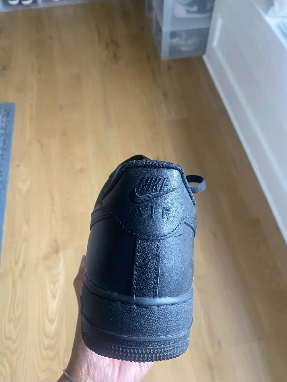 Nike Air Force’s Black Men’s Low-Top Leather Sneakers